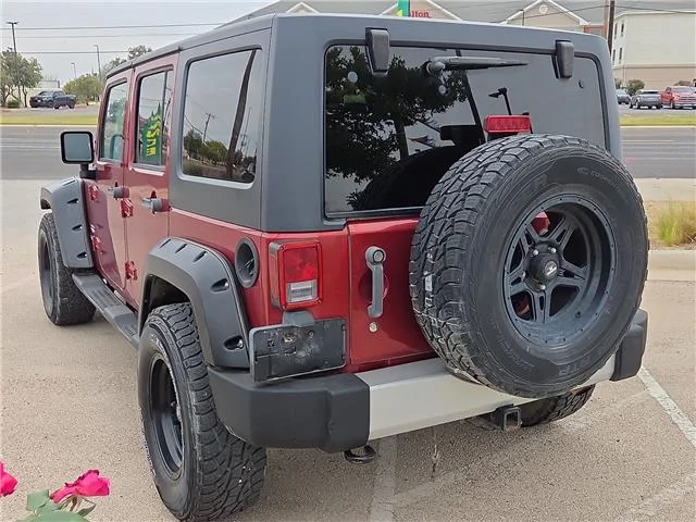 Used 2011 Red Jeep Sahara 4x4 image 2