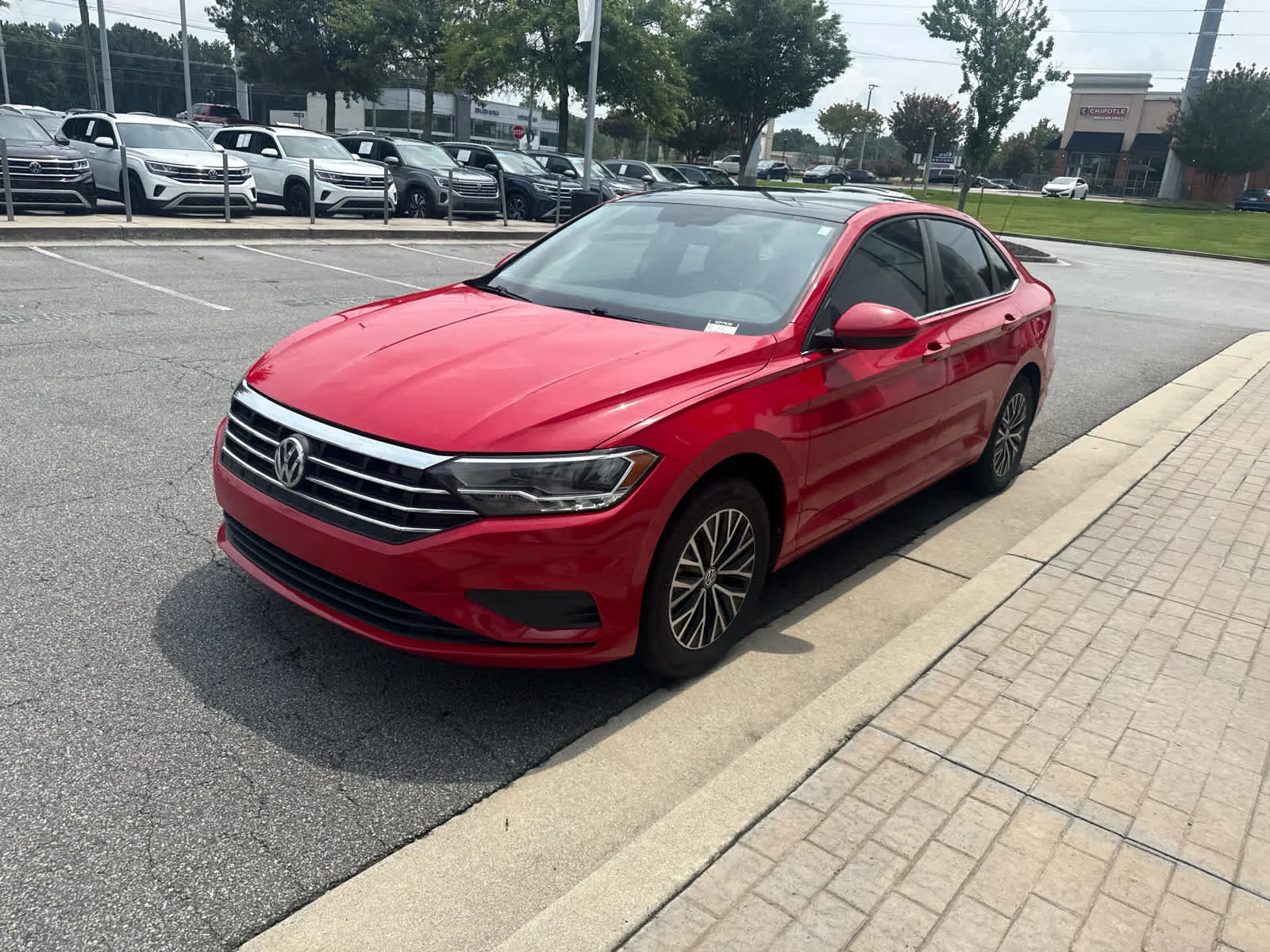 Used 2021 Tornado Red Volkswagen SE image 4