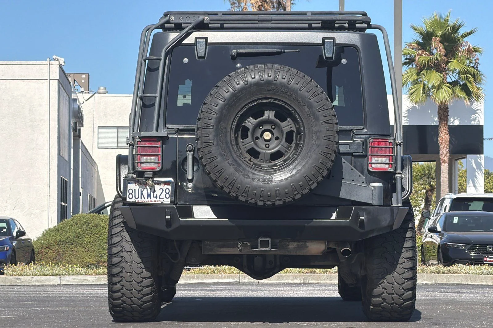 Used 2013 Black Jeep Unlimited Sport image 5