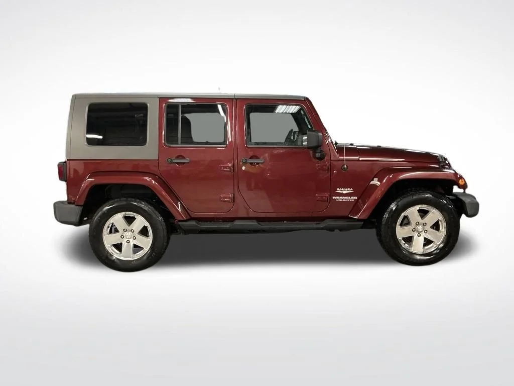 Used 2010 Red Jeep Unlimited Sahara image 7