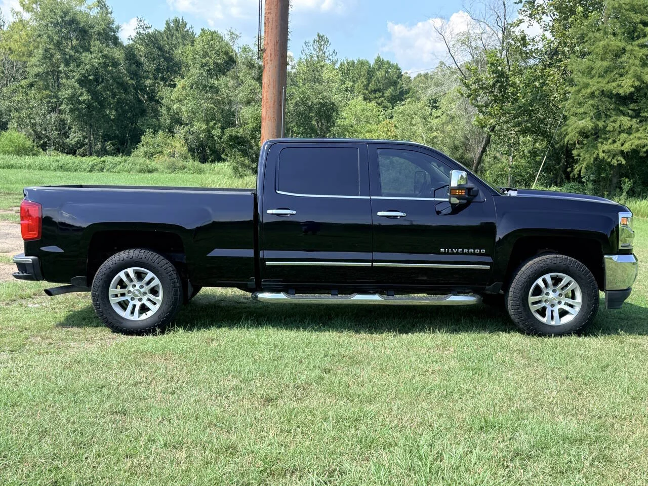 Used 2017 Black Chevrolet LTZ 4x4 4dr Crew Cab 6.5 ft. SB image 6