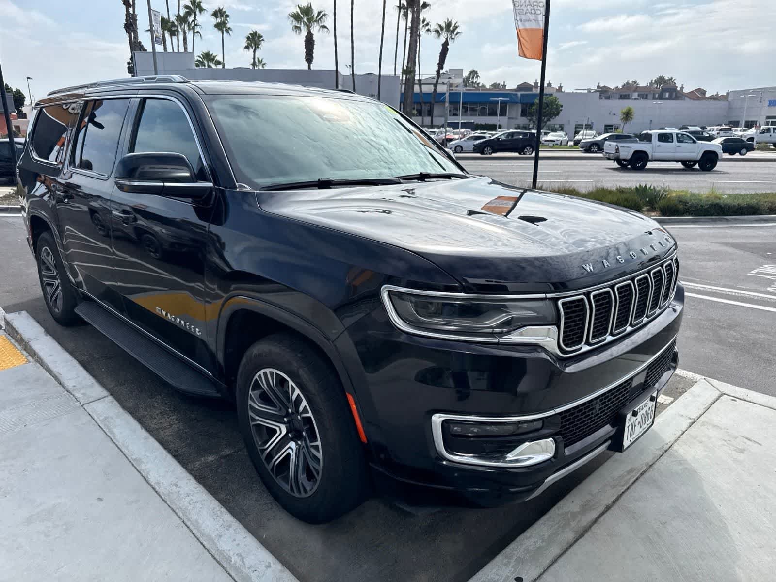 Used 2024 Diamond Black Crystal Pearlcoat Jeep Series II image 6