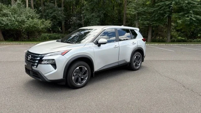 Used 2024 Brilliant Silver Metallic Nissan SV image 1