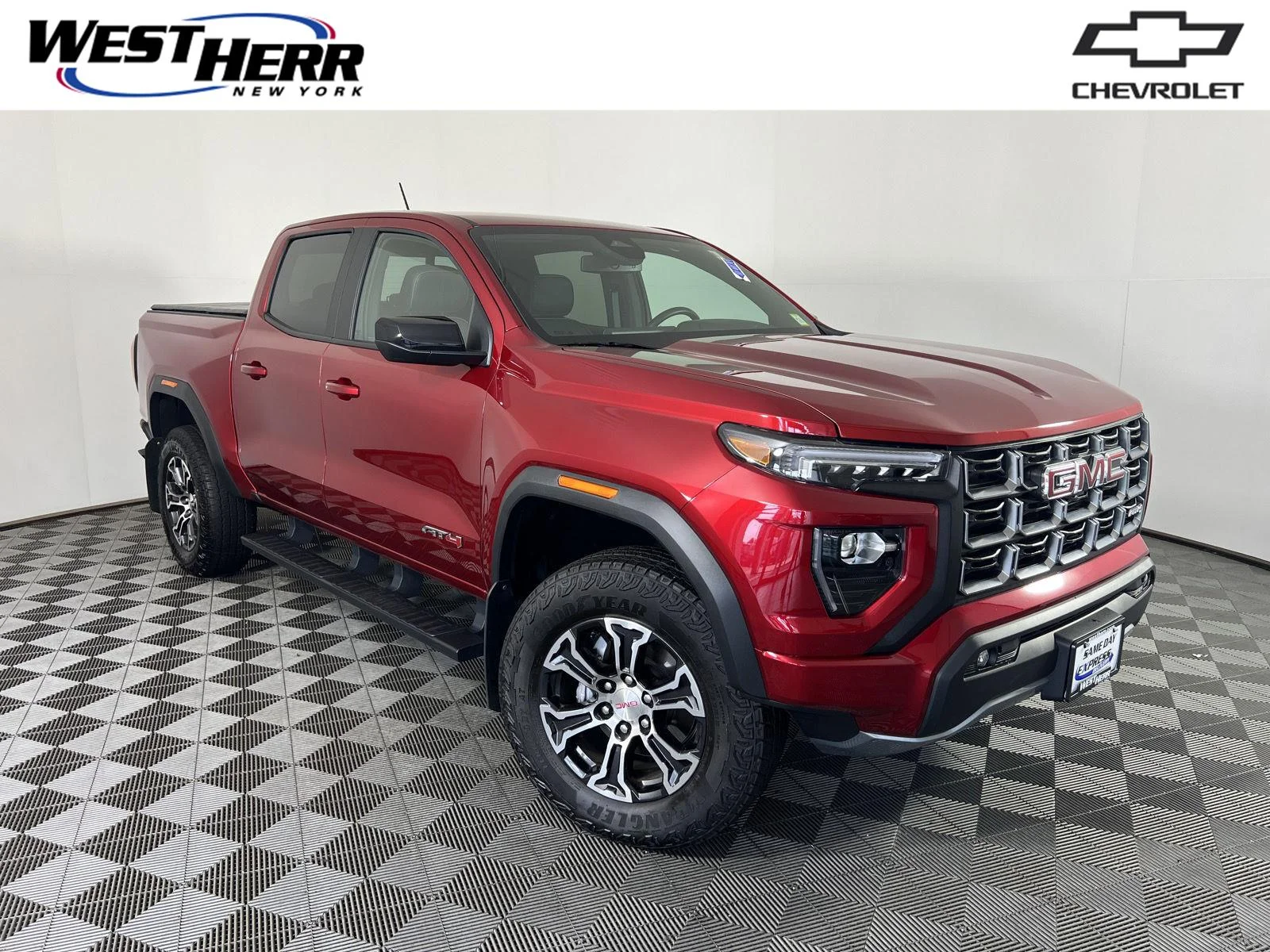 Used 2025 Volcanic Red Tintcoat GMC AT4 image 1