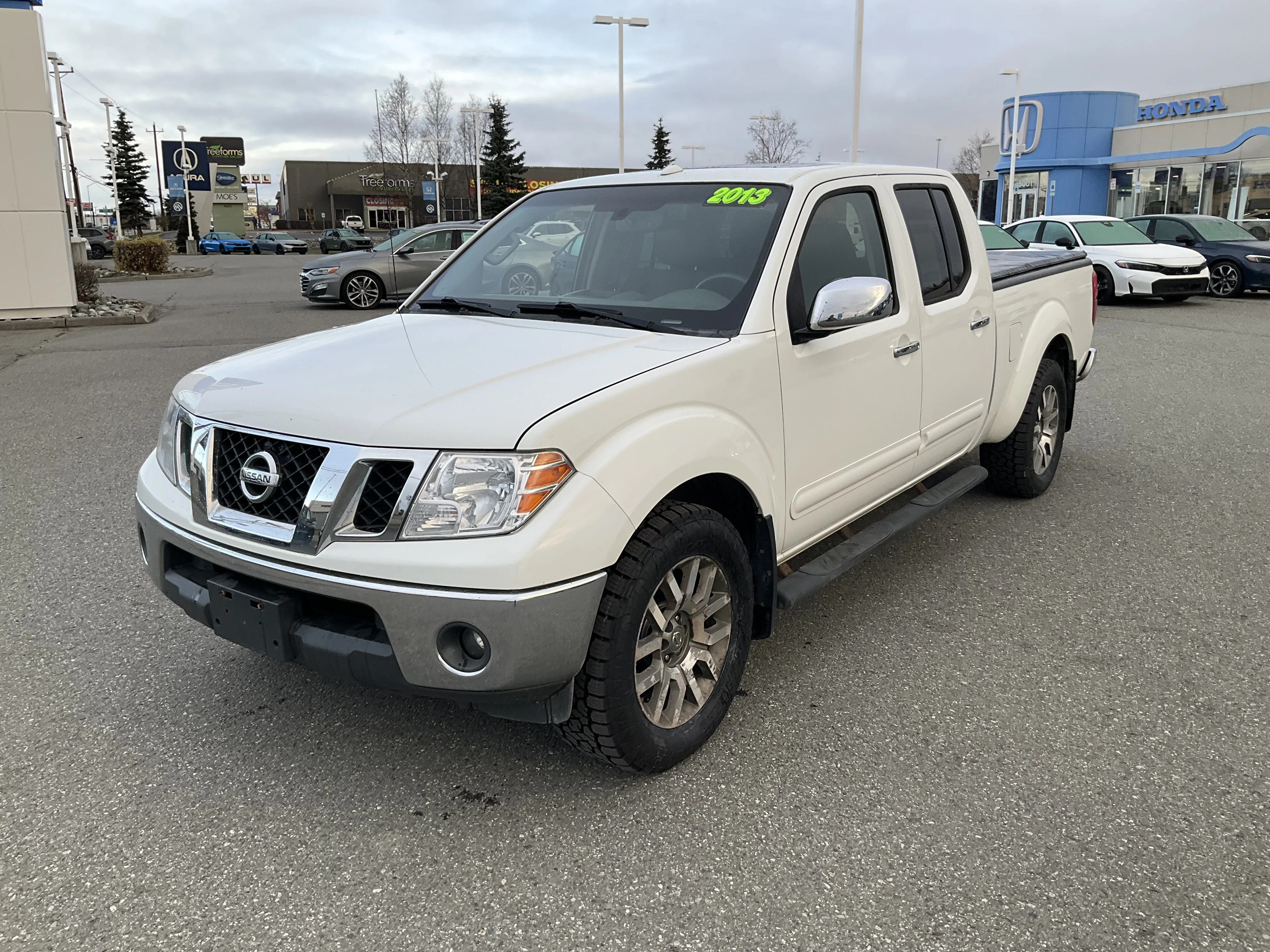 2013 Nissan Frontier 4.0 SL Crew Cab 4X4 AT LWB's photo