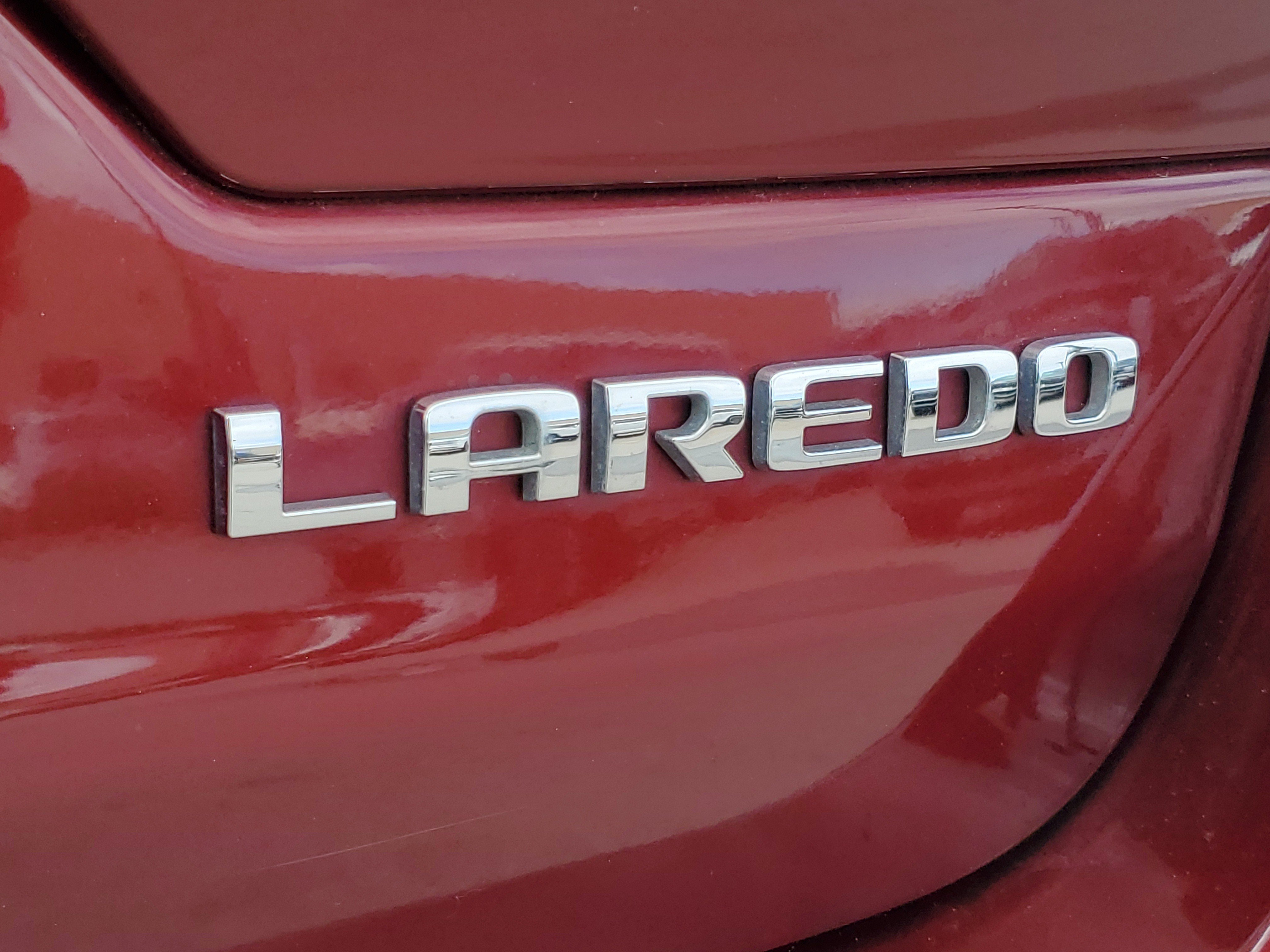 Used 2023 Velvet Red Pearlcoat Jeep Laredo image 8