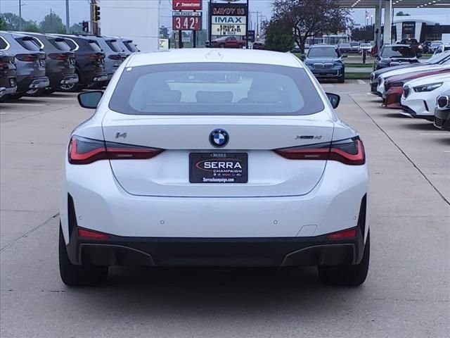 Used 2024 Mineral White Metallic BMW xDrive40 image 12