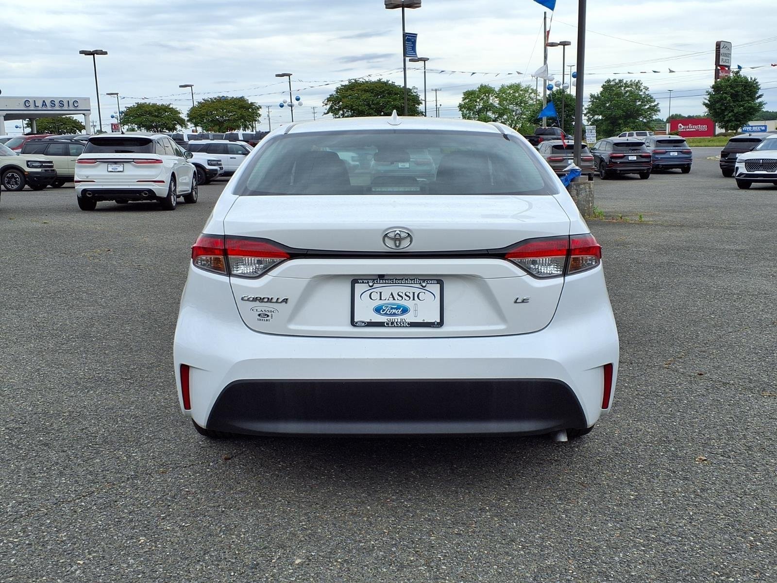 Used 2024 Midnight Black Metallic Toyota LE image 9