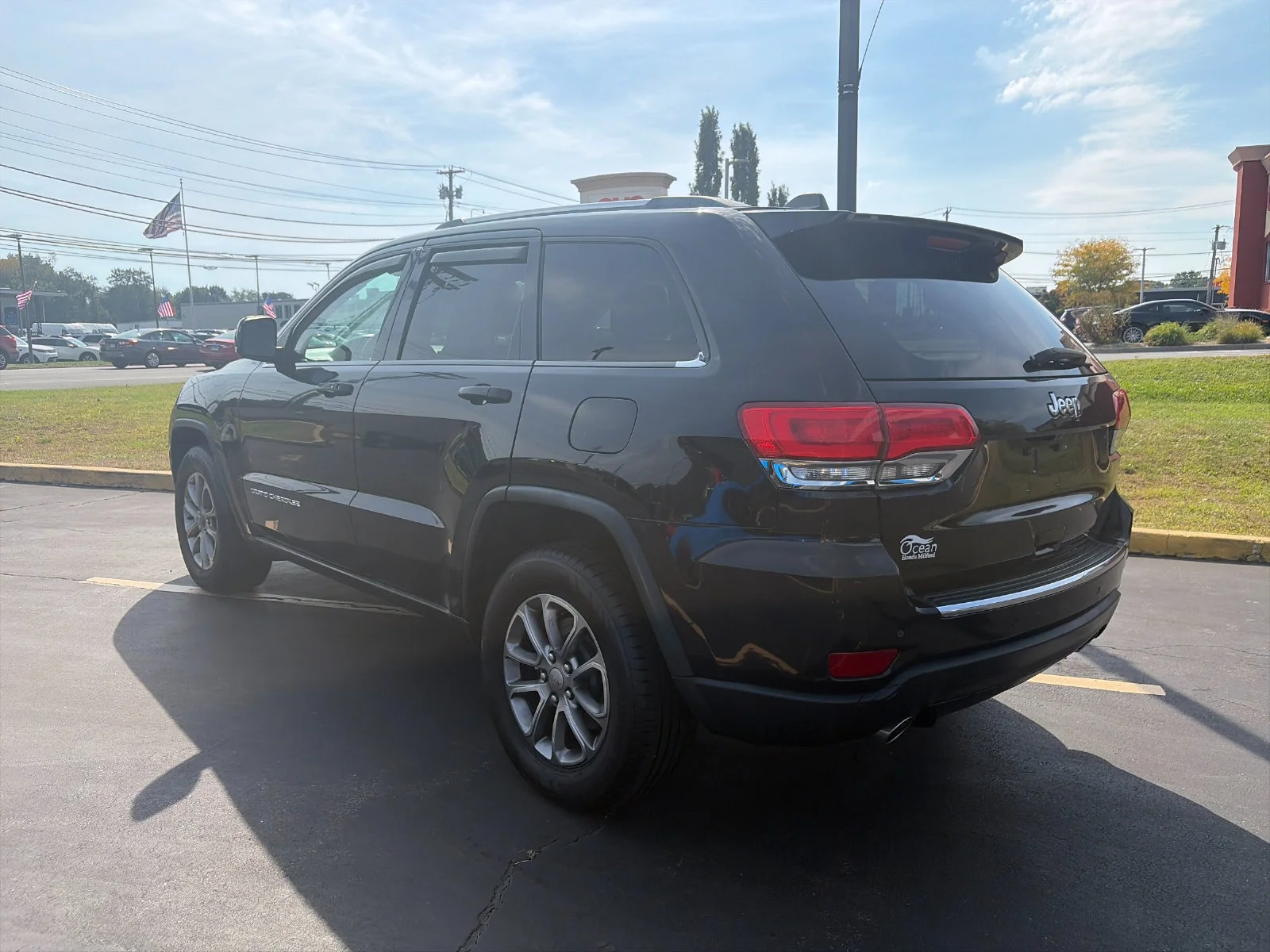Used 2014 Brilliant Black Crystal Pearlcoat Jeep Limited image 3