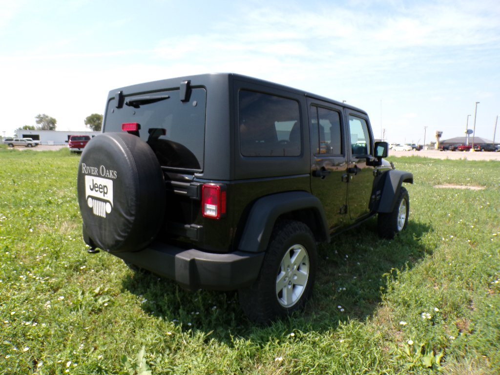Used 2016 Black Clearcoat Jeep Sport image 5