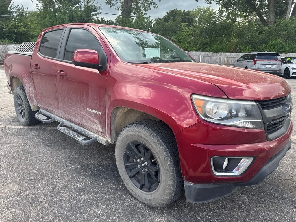 Certified Used 2018 Red Chevrolet Z71 image 1