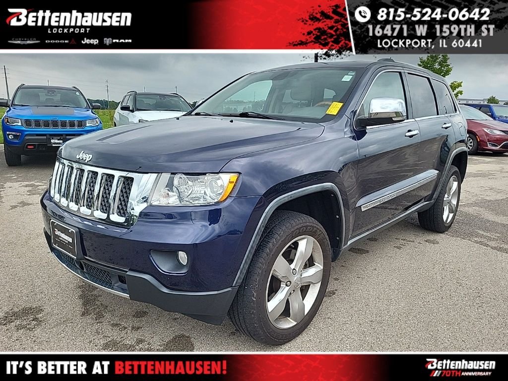 Used 2012 Blue Jeep Overland image 1