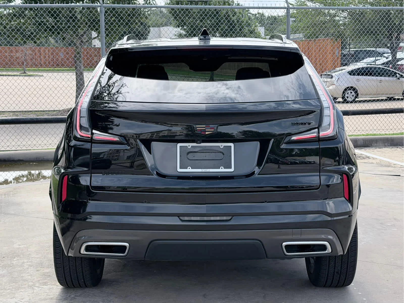 Used 2024 Stellar Black Metallic Cadillac Sport image 5