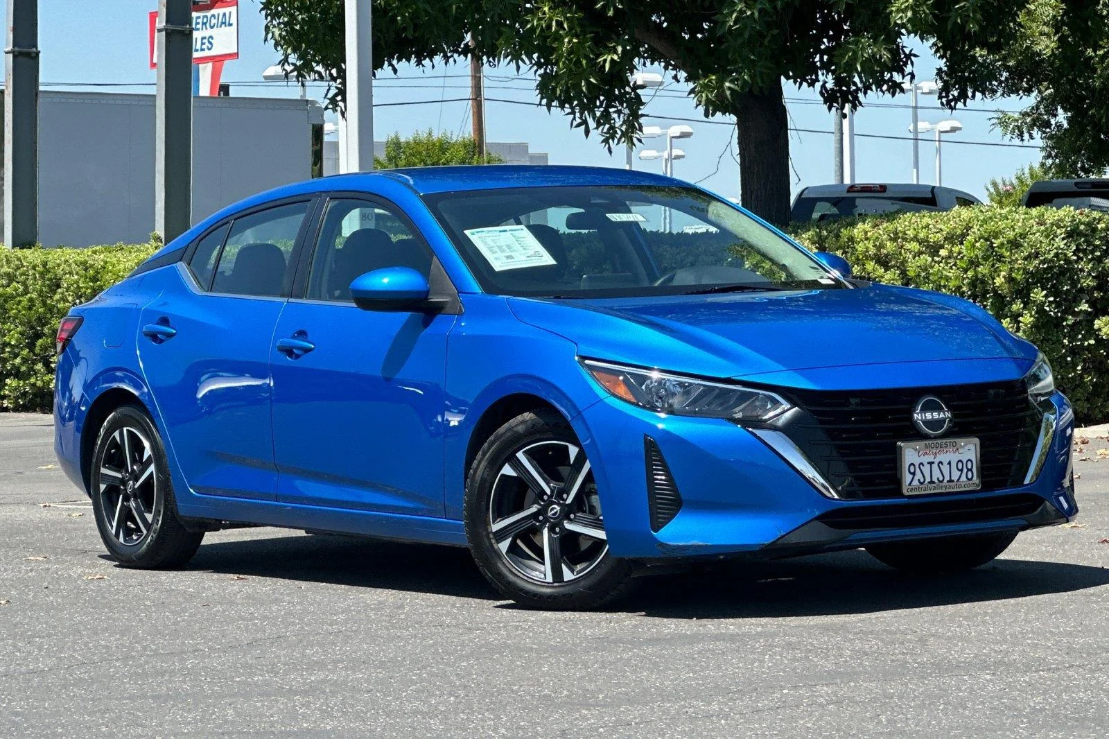 Used 2025 Electric Blue Metallic Nissan SV image 2