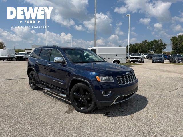 Used 2015 True Blue Pearlcoat Jeep Limited image 1