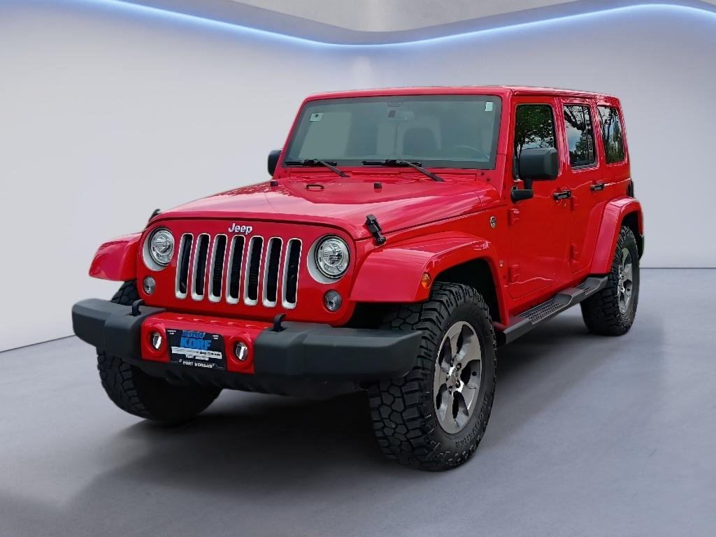 Used 2017 Firecracker Red Clearcoat Jeep Sahara image 1