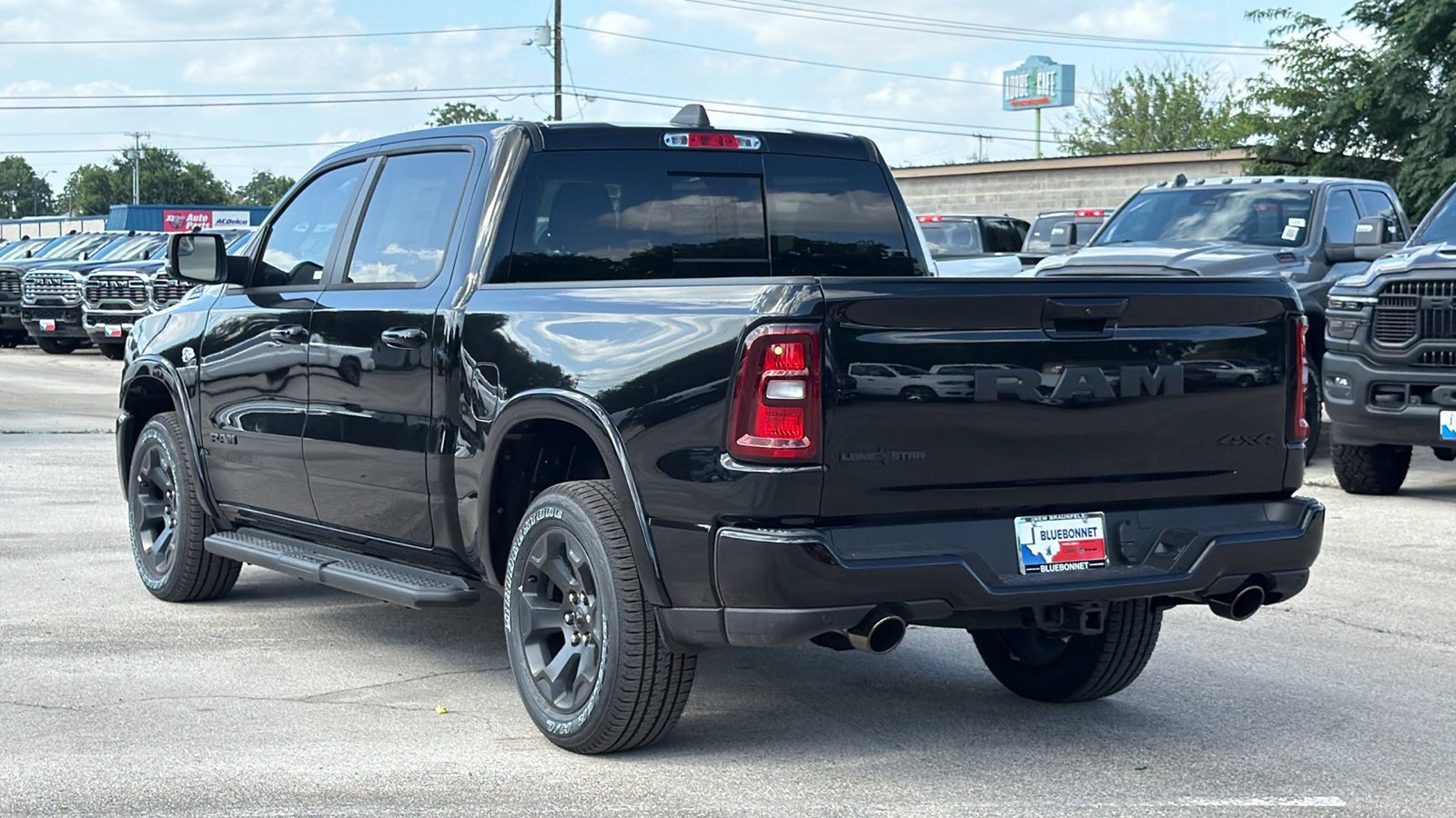 New 2026 Diamond Black Crystal Pearl-Coat Exterior Paint RAM Lone Star image 7