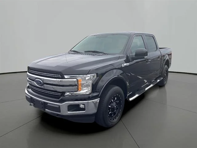 Used 2018 Shadow Black Ford Lariat image 1