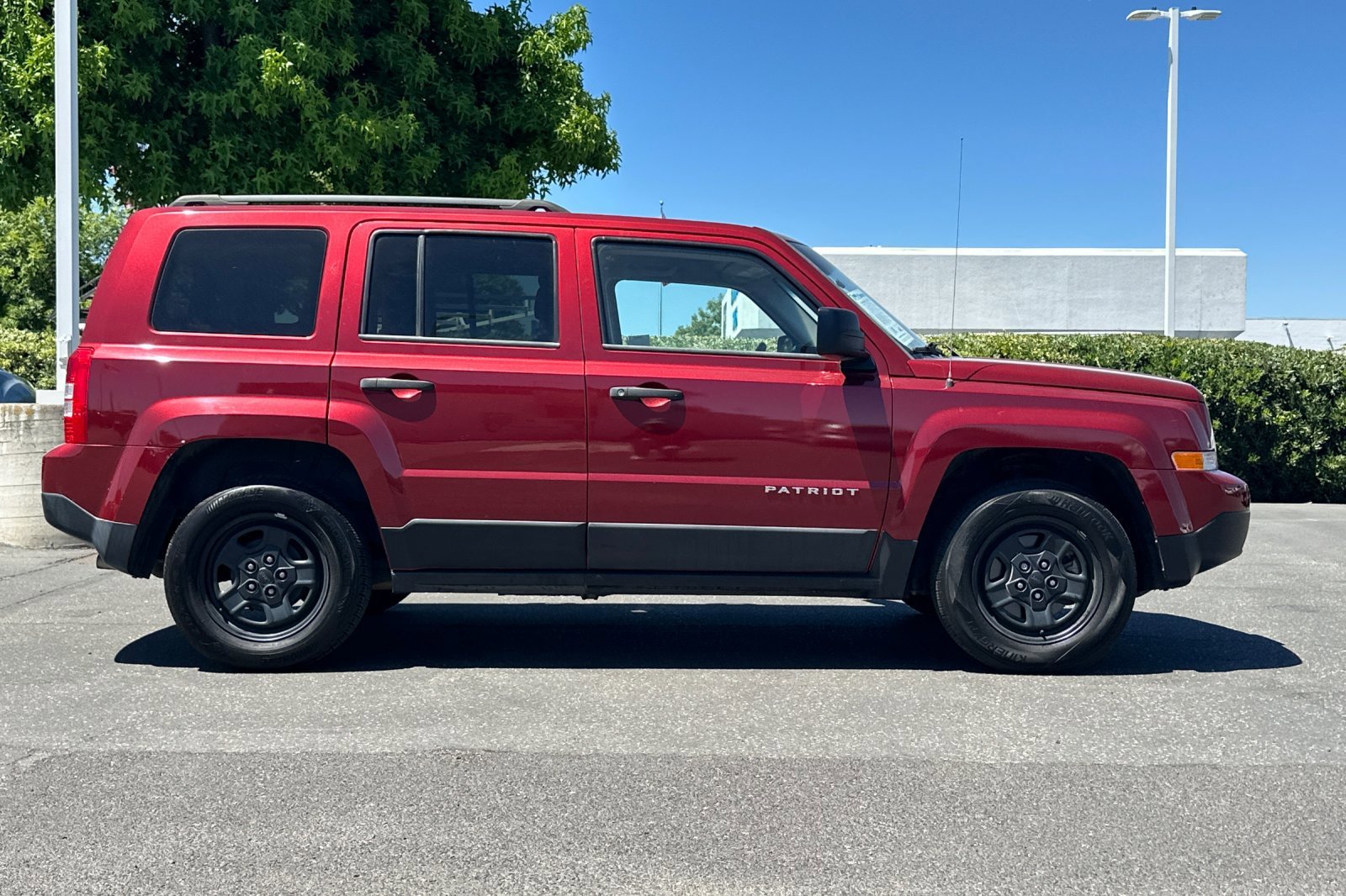 Used 2016 Deep Cherry Red Crystal Pearlcoat Jeep Sport image 3