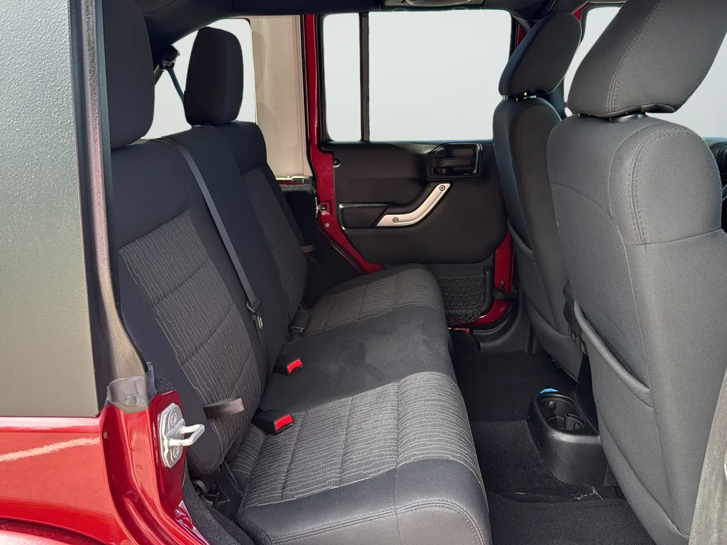 Used 2012 Red Jeep Unlimited Sahara image 19