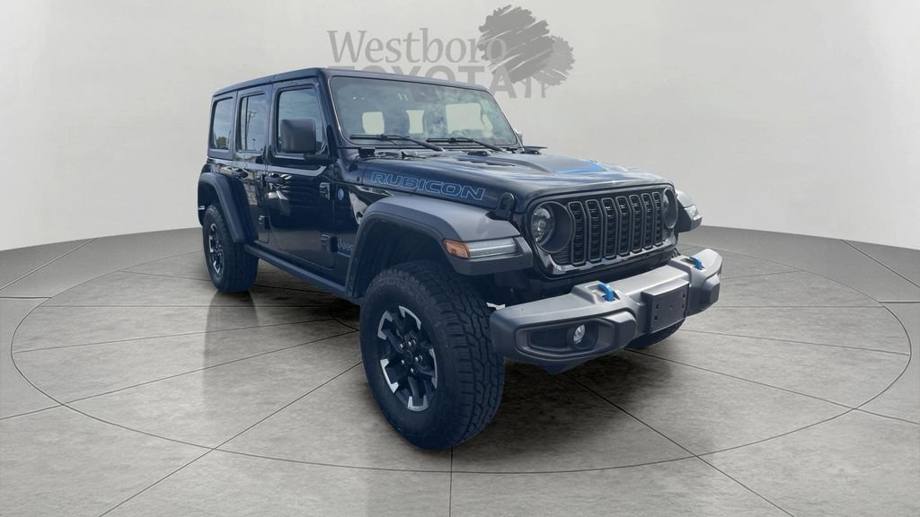 Used 2024 Black Jeep Hybrid Rubicon 4xe image 1