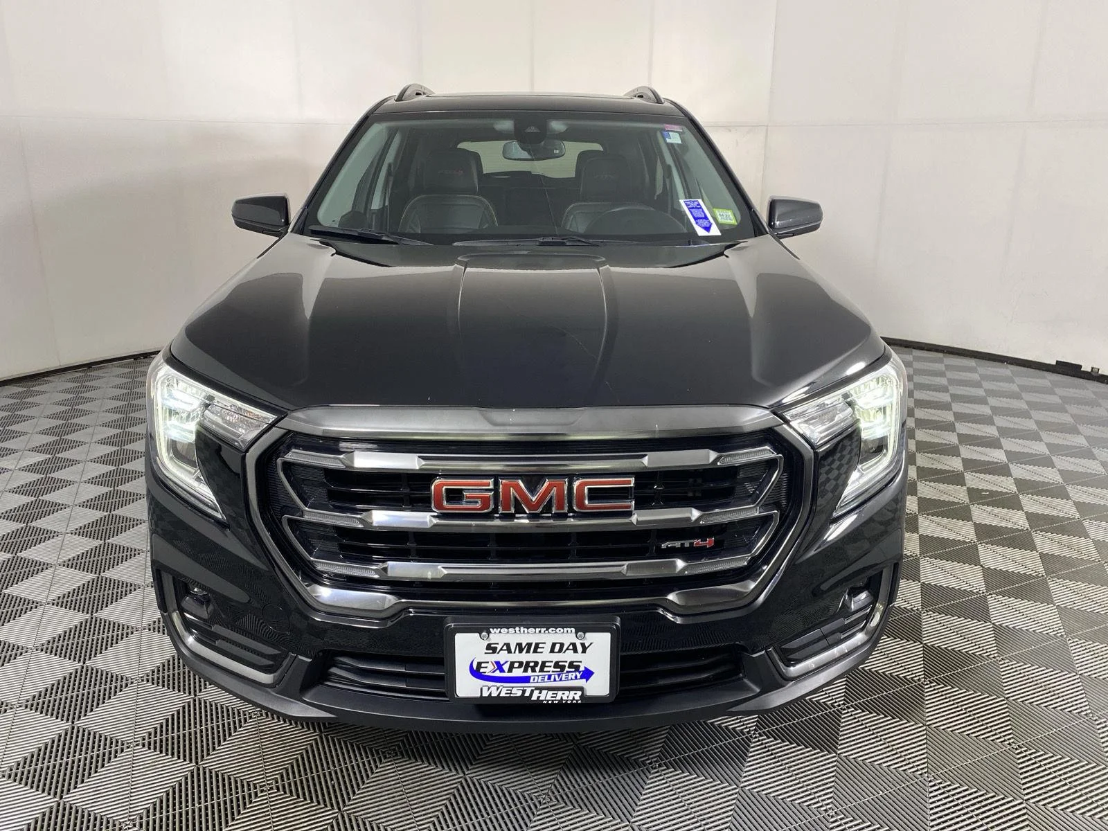 Used 2024 Ebony Twilight Metallic GMC AT4 image 9