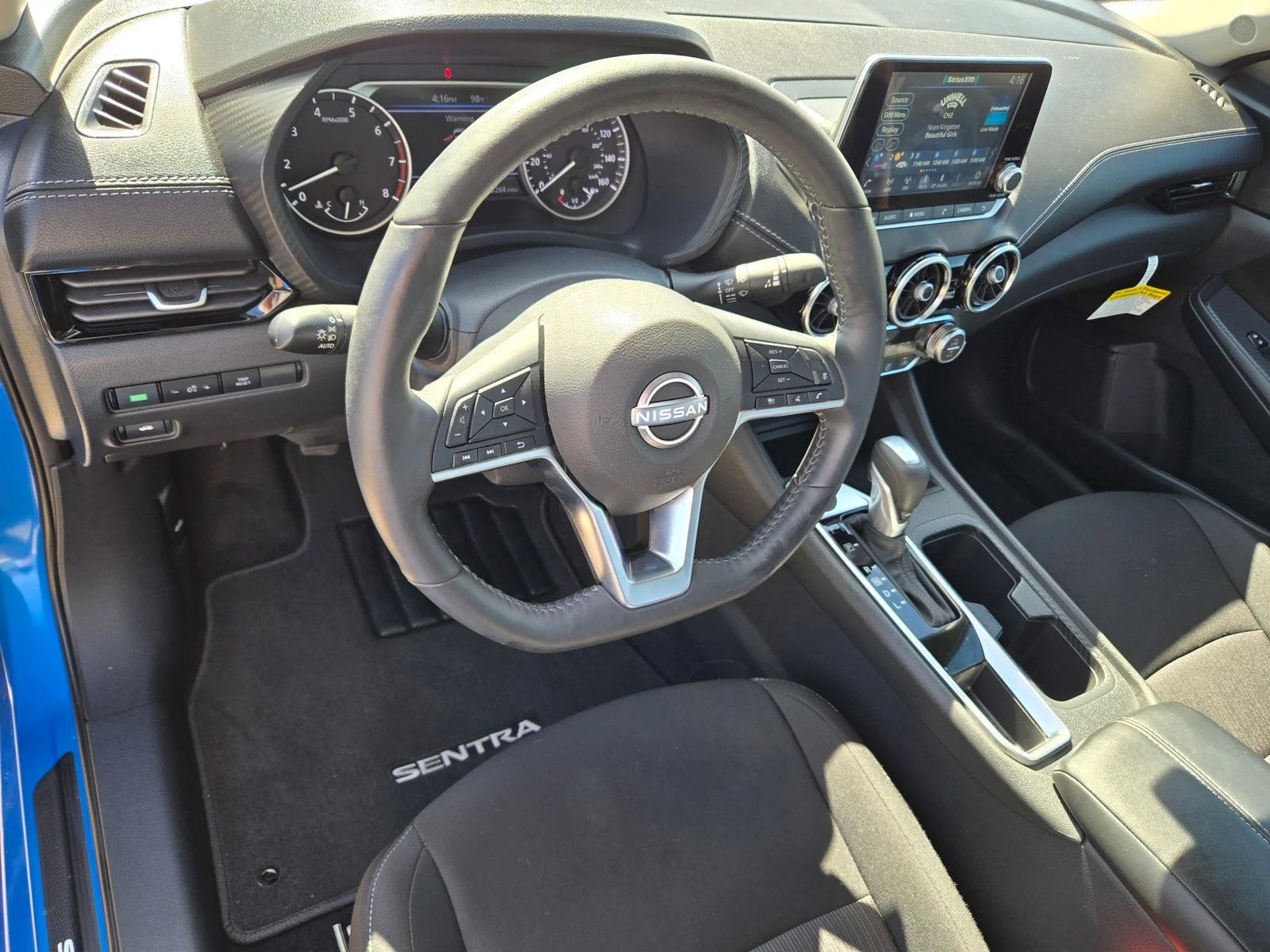 Used 2025 Electric Blue Metallic Nissan SV image 18