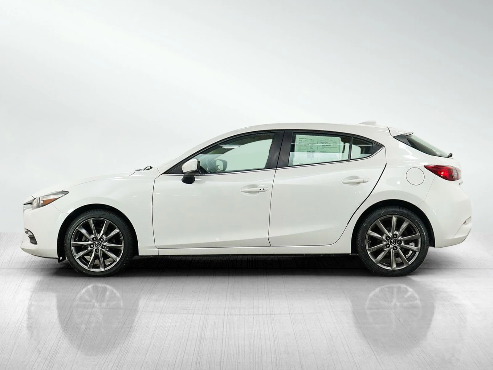 Used 2018 Mazda Mazda3 Touring with VIN 3MZBN1L32JM265987 for sale in Roseville, Minnesota