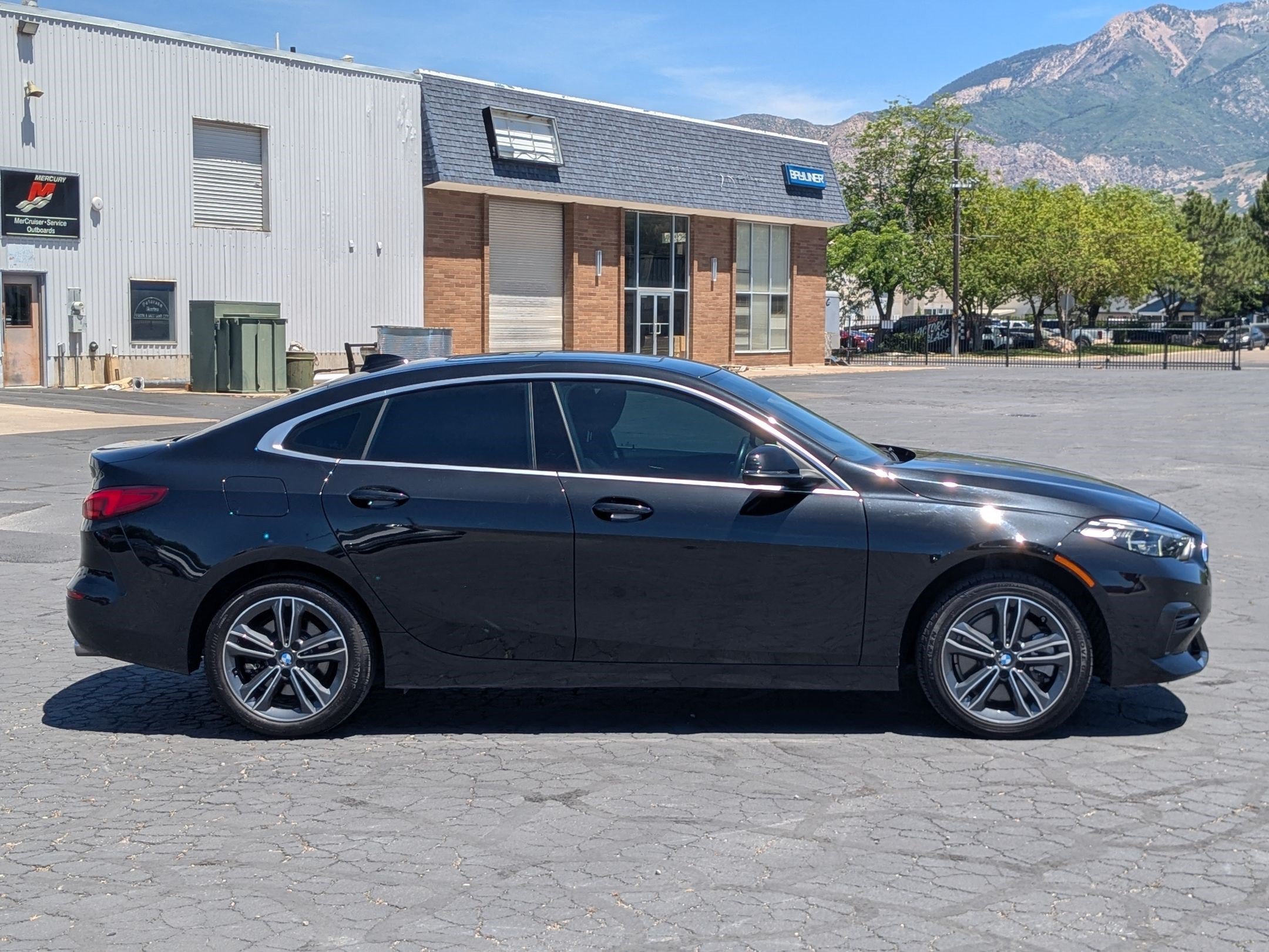 Used 2024 Black Sapphire Metallic BMW 228i image 2