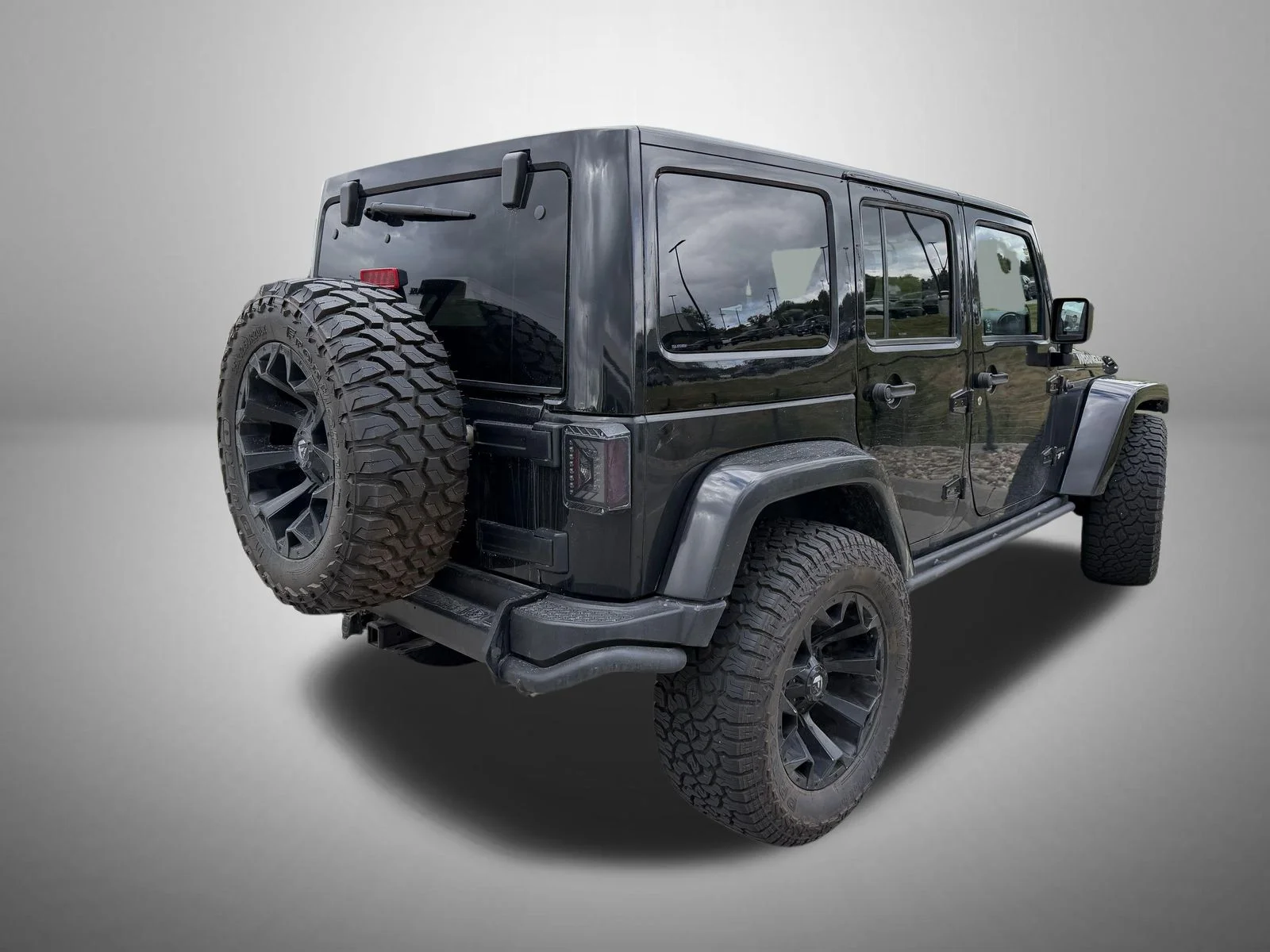 Used 2017 Black Jeep Unlimited Sahara image 4