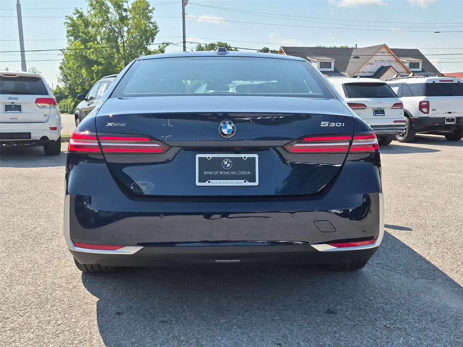 Used 2026 Tanzanite Blue II Metallic BMW 530i xDrive image 4