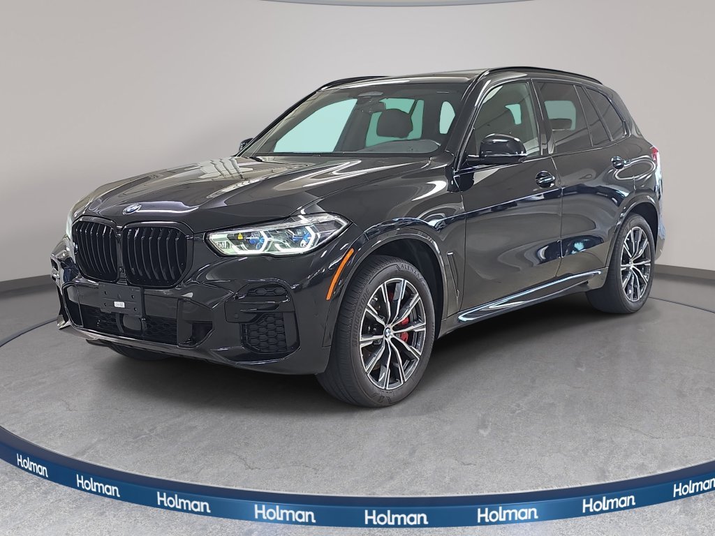 Certified Used 2023 Black Sapphire Metallic BMW M50i image 1