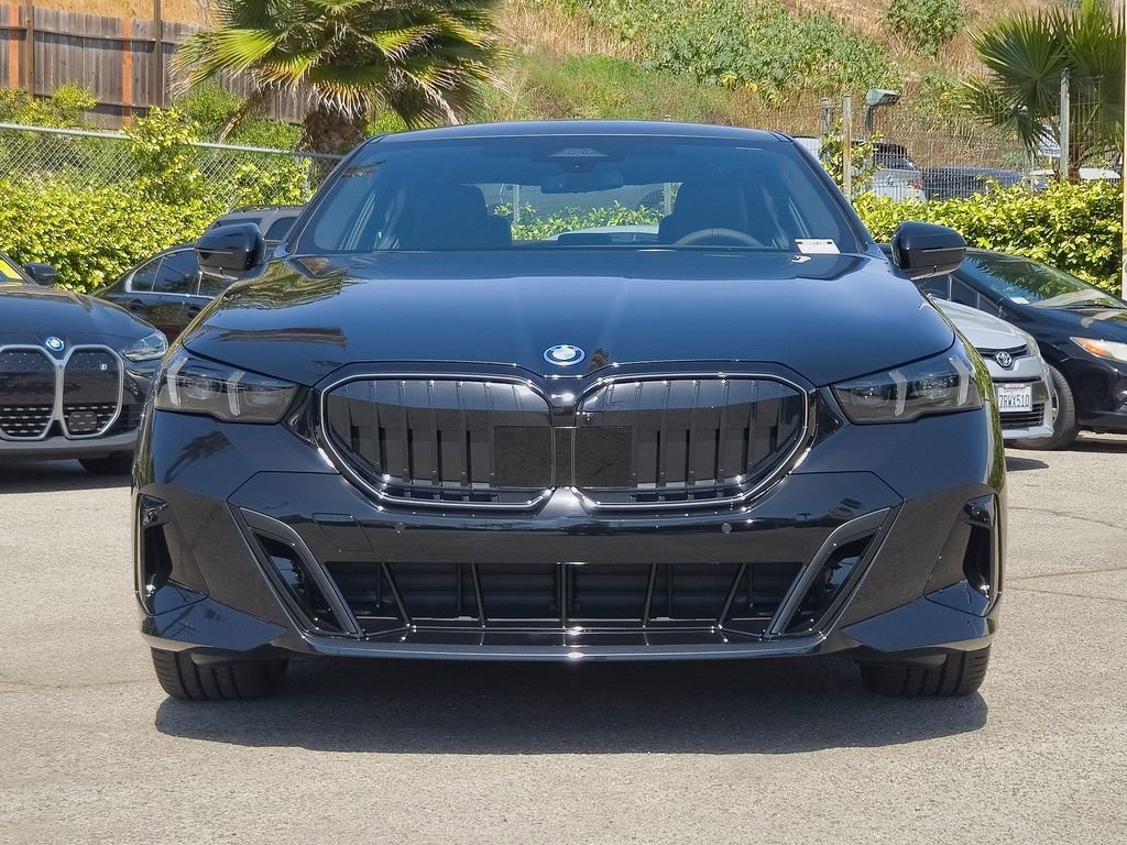 New 2026 Black Sapphire Metallic BMW 550e xDrive image 3