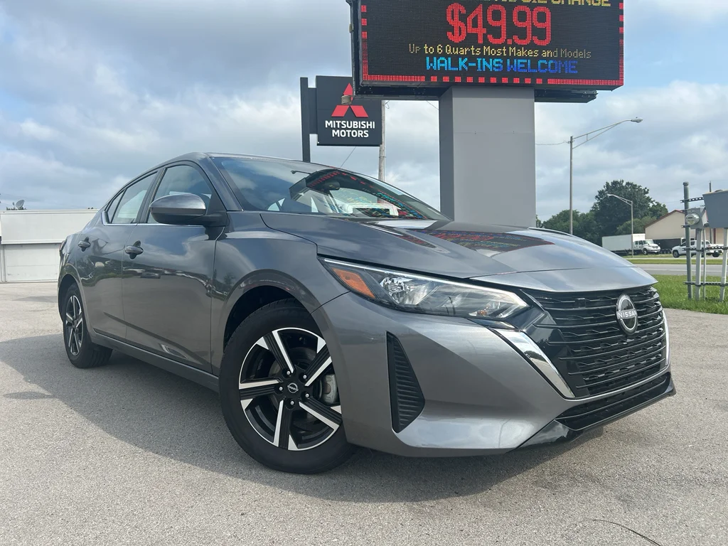 Used 2024 Gun Metallic Nissan SV image 1
