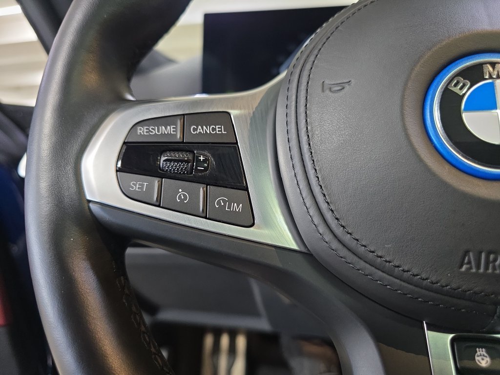 Used 2023 Tanzanite Blue II Metallic BMW eDrive40 image 20