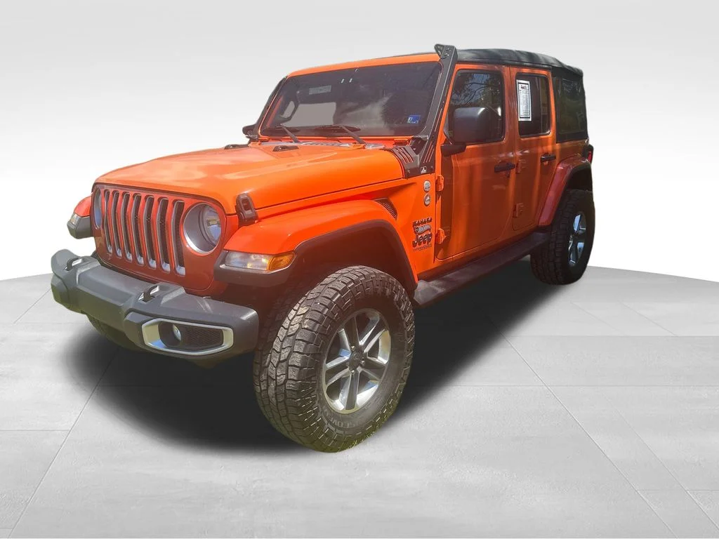 Used 2018 Orange Jeep Unlimited Sahara image 2