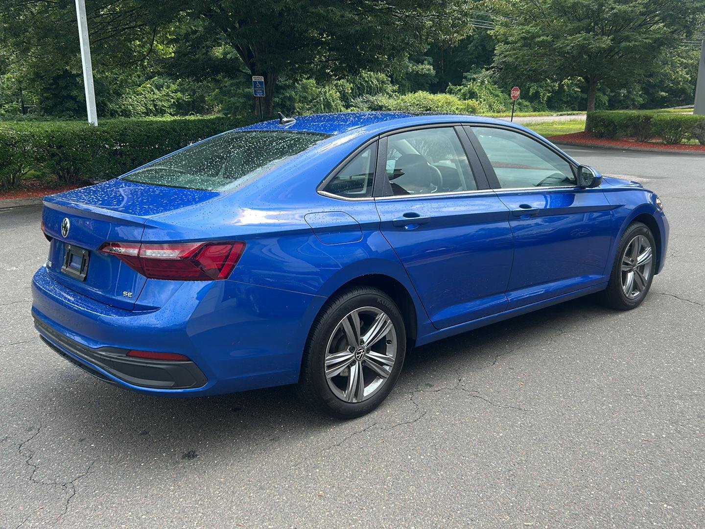 Used 2023 Rising Blue Metallic Volkswagen SE image 5