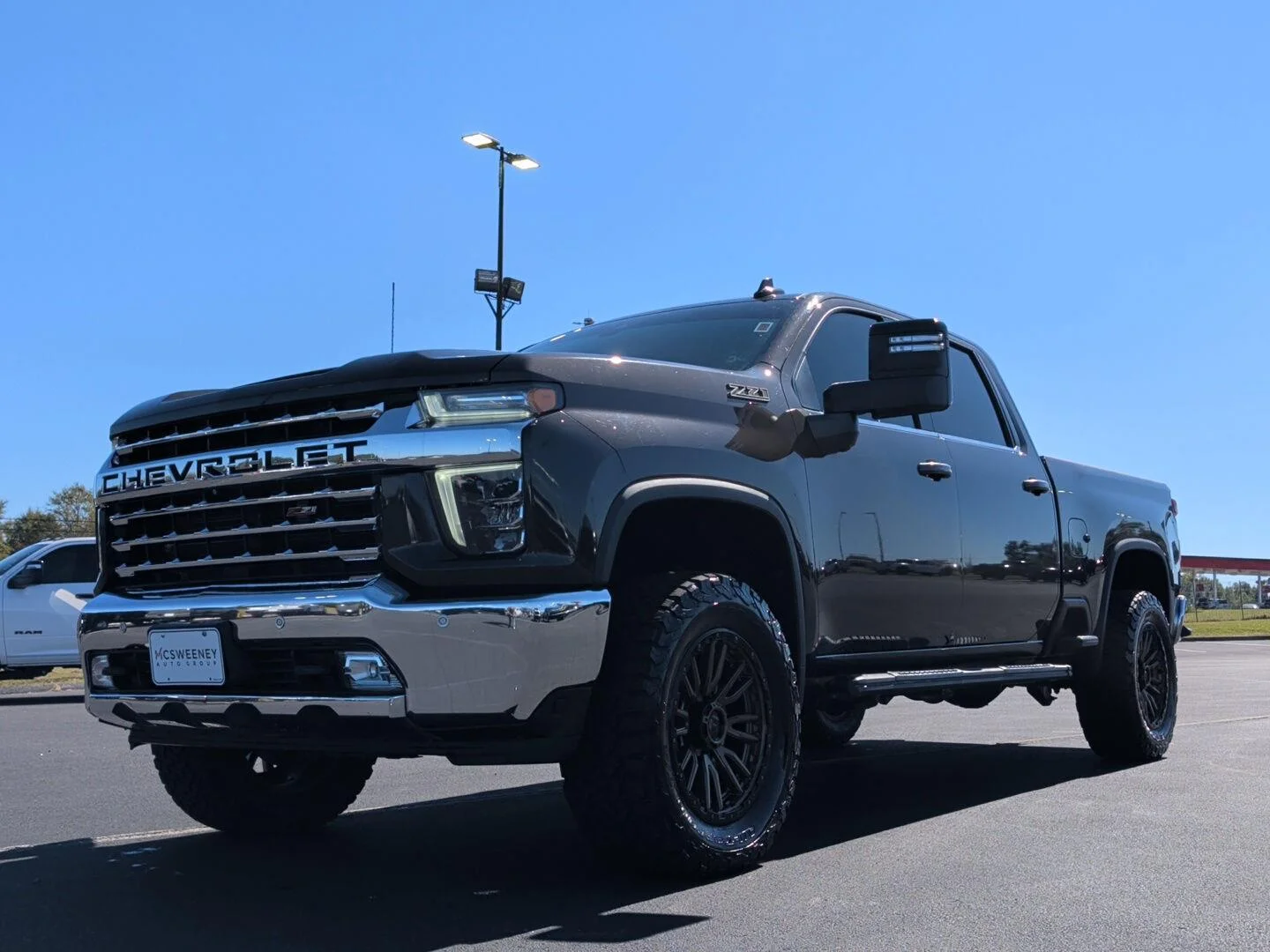 Used 2021 OXFORD BROWN METALLIC Chevrolet LTZ image 1