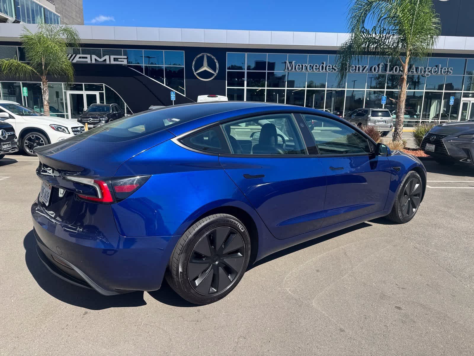 Used 2024 Deep Blue Metallic Tesla  image 3