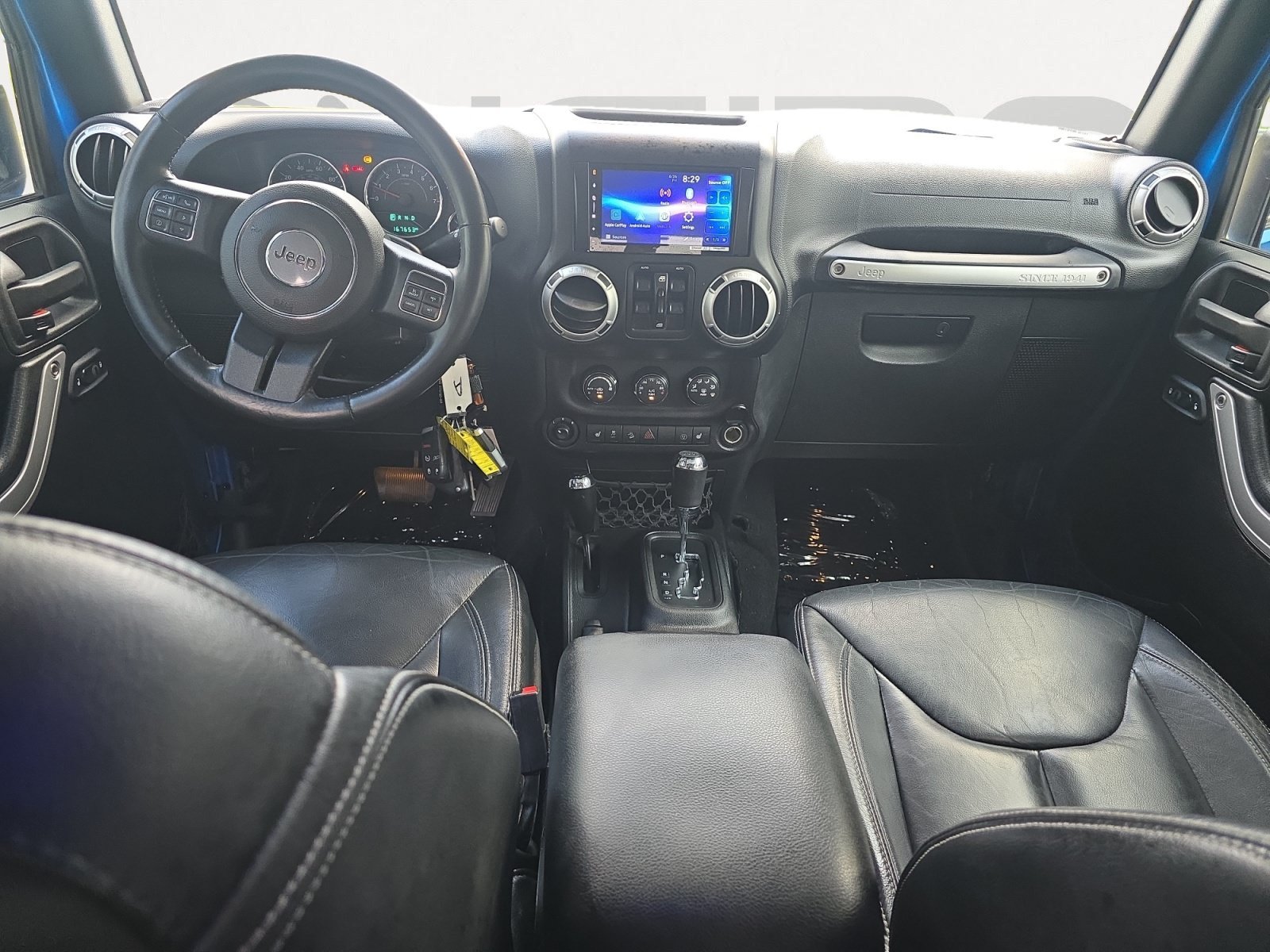 Used 2015 Hydro Blue Pearl Coat Jeep Sahara image 2