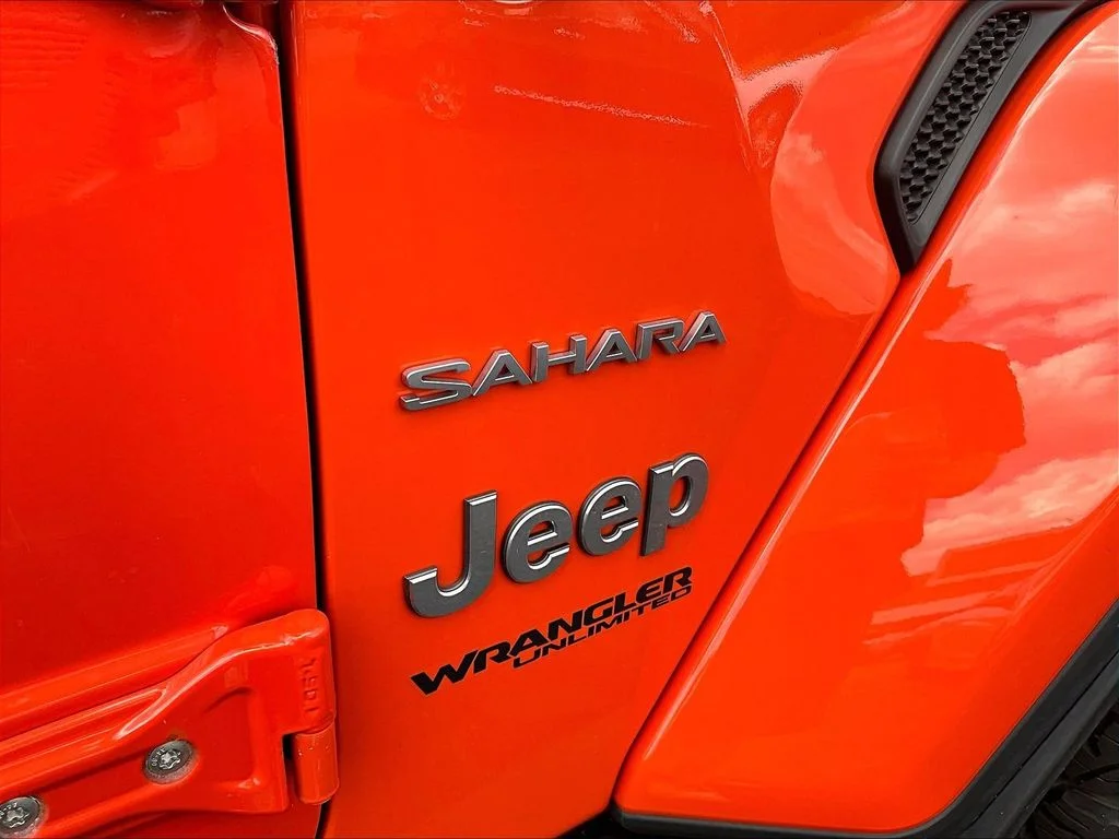 Used 2018 Orange Jeep Unlimited Sahara image 8