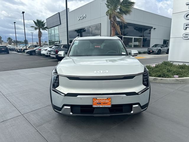 New 2026 Ivory Silver Kia Wind AWD image 2