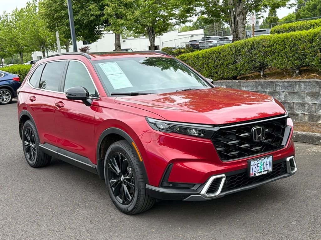 Used 2025 Radiant Red Metallic Honda Sport Touring image 1