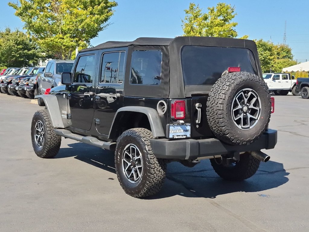 Used 2015 Black Jeep Unlimited Sport image 4