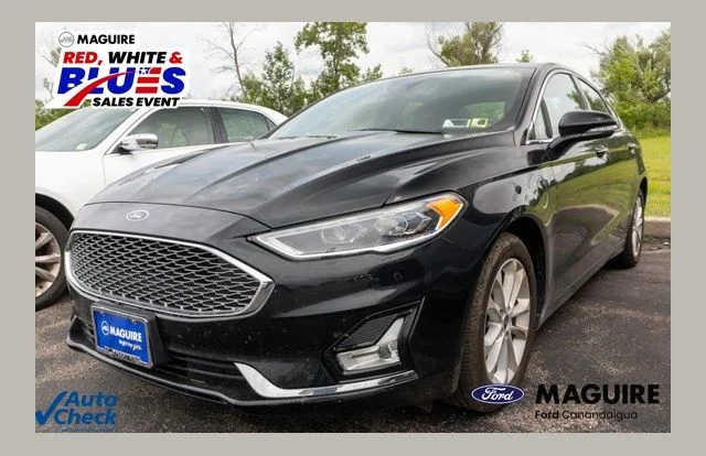Used 2020 Black Metallic Ford Titanium image 1