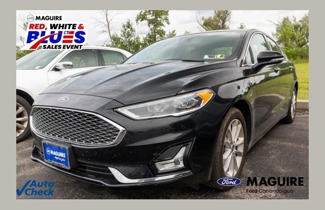Used 2020 Black Metallic Ford Titanium image 1