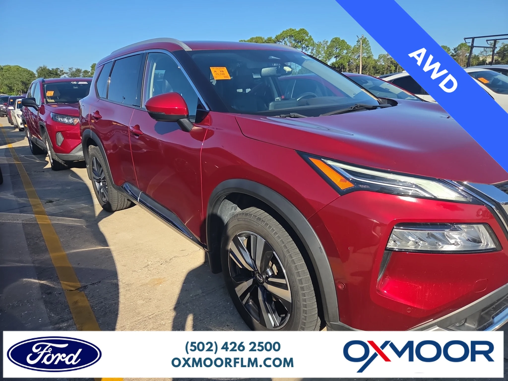 Used 2021 Scarlet Ember Tintcoat Nissan Platinum image 1