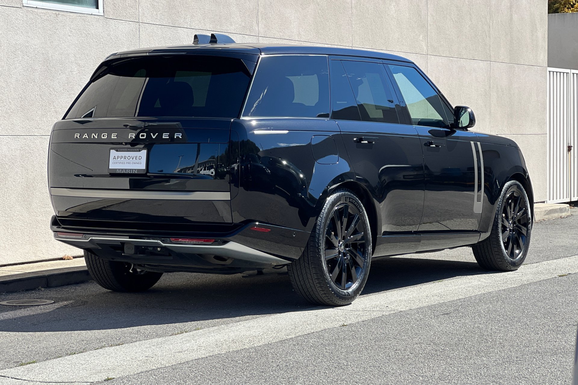 Certified Used 2024 Santorini Black Metallic Land Rover SE image 2
