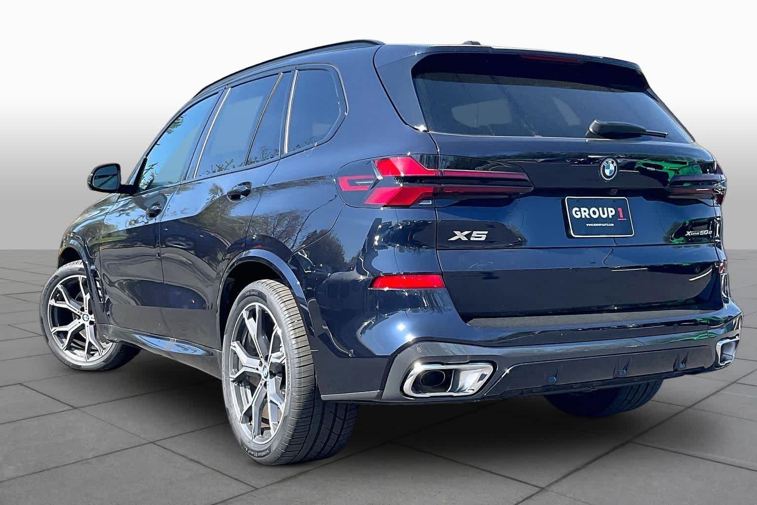 New 2026 Carbon Black Metallic BMW xDrive50e image 12
