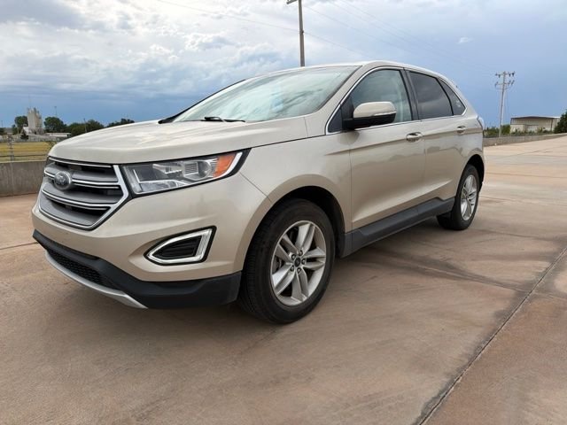 Used 2018 Gold Ford SEL image 1